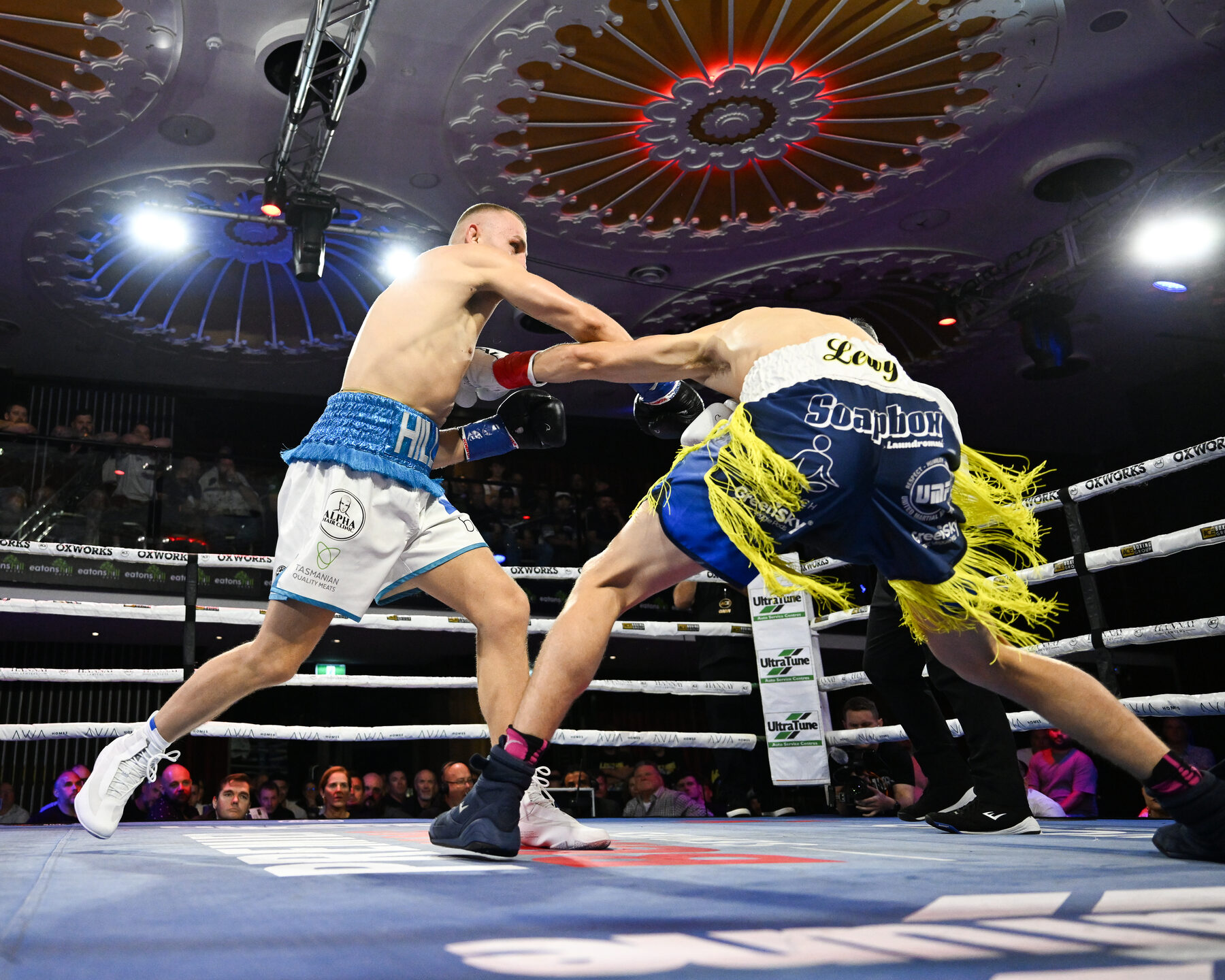 Final glove check at ringside before the bell